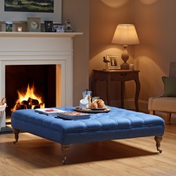 Glenmore Deep Buttoned Footstool with Border 122 x 122cm (48 x 48") Wool Plain Blue - 7.5ins Castor Leg Washed Oak Glenmore Deep Buttoned Footstool with Border 122 x 122cm (48 x 48") Wool Plain Blue - 7.5ins Castor Leg Washed Oak
