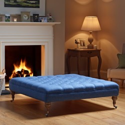 Glenmore Deep Buttoned Footstool with Border 122 x 122cm (48 x 48") Wool Plain Blue - 7.5ins Castor Leg Washed Oak Glenmore Deep Buttoned Footstool with Border 122 x 122cm (48 x 48") Wool Plain Blue - 7.5ins Castor Leg Washed Oak