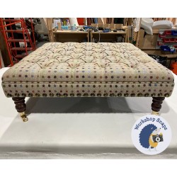 Glenmore Deep Buttoned Footstool with Border 91 x 91cm (36 x 36") Wool Spot Natural - Full Vintage Studs - 7ins Castor Mahogany Leg 6341