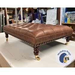 Glenmore Deep Buttoned Footstool with Border 102 x 76cm (40 x 30") Antique Matt Leather Mahogany - Full Stud Trim - 7ins Castor Mahogany Leg 8258 Glenmore Deep Buttoned Footstool with Border 102 x 76cm (40 x 30") Antique Matt Leather Mahogany - Full Stud Trim - 7ins Castor Mahogany Leg 8258