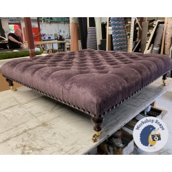 Kinver Deep Buttoned Footstool 122 x 122cm (48 x 48") House Velvet Aubergine - Full Vintage Stud Trim - 6ins Castor Mahogany Leg 7417