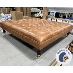 Glenmore Deep Buttoned Footstool with Border 122 x 122cm (48 x 48") Antique Matt Leather Bridle - Single Piped Trim - 7" Castor Mahogany Leg 5644 Glenmore Deep Buttoned Footstool with Border 122 x 122cm (48 x 48") Antique Matt Leather Bridle - Single Piped Trim - 7" Castor Mahogany Leg 5644