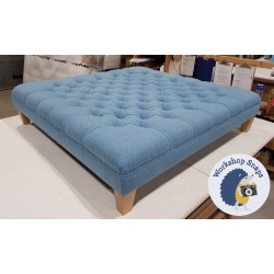 Glenmore Deep Buttoned Footstool with Border 122 x 122cm (48 x 48") Faux Wool Wedgwood - 5ins Tapered Leg Natural 4268 Glenmore Deep Buttoned Footstool with Border 122 x 122cm (48 x 48") Faux Wool Wedgwood - 5ins Tapered Leg Natural 4268