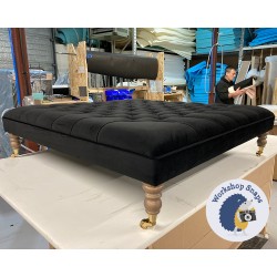 Glenmore Deep Buttoned Footstool with Border 122 x 122cm (48 x 48") JBrown Amalfi Black - 7ins Castor Oak Leg 8316 Glenmore Deep Buttoned Footstool with Border 122 x 122cm (48 x 48") JBrown Amalfi Black - 7ins Castor Oak Leg 8316