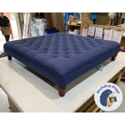 Glenmore Deep Buttoned Footstool with Border 122 x 122cm (48 x 48") Textured Weave Indigo - Single Piped Trim - 5ins Turned Mahogany Leg 4923 Glenmore Deep Buttoned Footstool with Border 122 x 122cm (48 x 48") Textured Weave Indigo - Single Piped Trim - 5ins Turned Mahogany Leg 4923