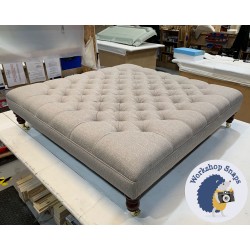 Glenmore Deep Buttoned Footstool with Border 122 x 122cm (48 x 48") Textured Weave Stone - 7ins Castor Mahogany Leg 4809 Glenmore Deep Buttoned Footstool with Border 122 x 122cm (48 x 48") Textured Weave Stone - 7ins Castor Mahogany Leg 4809