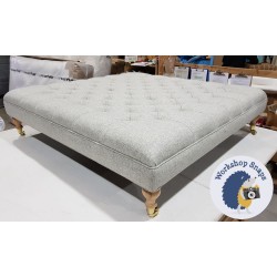 Glenmore Deep Buttoned Footstool with Border 122 x 122cm (48 x 48") Wool Plain Light Grey - 6ins Castor Leg Natural Glenmore Deep Buttoned Footstool with Border 122 x 122cm (48 x 48") Wool Plain Light Grey - 6ins Castor Leg Natural