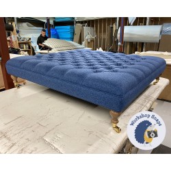 Glenmore Deep Buttoned Footstool with Border 122 x 122cm (48 x 48") Wool Plain Blue - Single Piped Trim - 6ins Castor Oak Leg 7959 Glenmore Deep Buttoned Footstool with Border 122 x 122cm (48 x 48") Wool Plain Blue - Single Piped Trim - 6ins Castor Oak Leg 7959