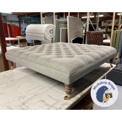 Glenmore Deep Buttoned Footstool with Border 122 x 122cm (48 x 48") Wool Plain Light Grey - Single Piped Trim - 7ins Castor Oak Leg 9248 Glenmore Deep Buttoned Footstool with Border 122 x 122cm (48 x 48") Wool Plain Light Grey - Single Piped Trim - 7ins Castor Oak Leg 9248