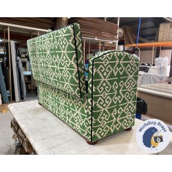 Caldey Plain Lid Curved Arm Storage Ottoman 144 x 56cm (56.5 x 22") COM Haines Collection - Contrast Piped COM - Dark Bun Feet 226056